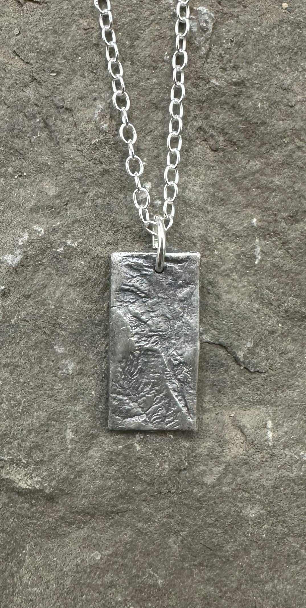 Fine Silver necklace of Capitol Reef National Park made from topographic data.