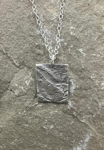 Fine Silver necklace of Arches National Park made from topographic data.
