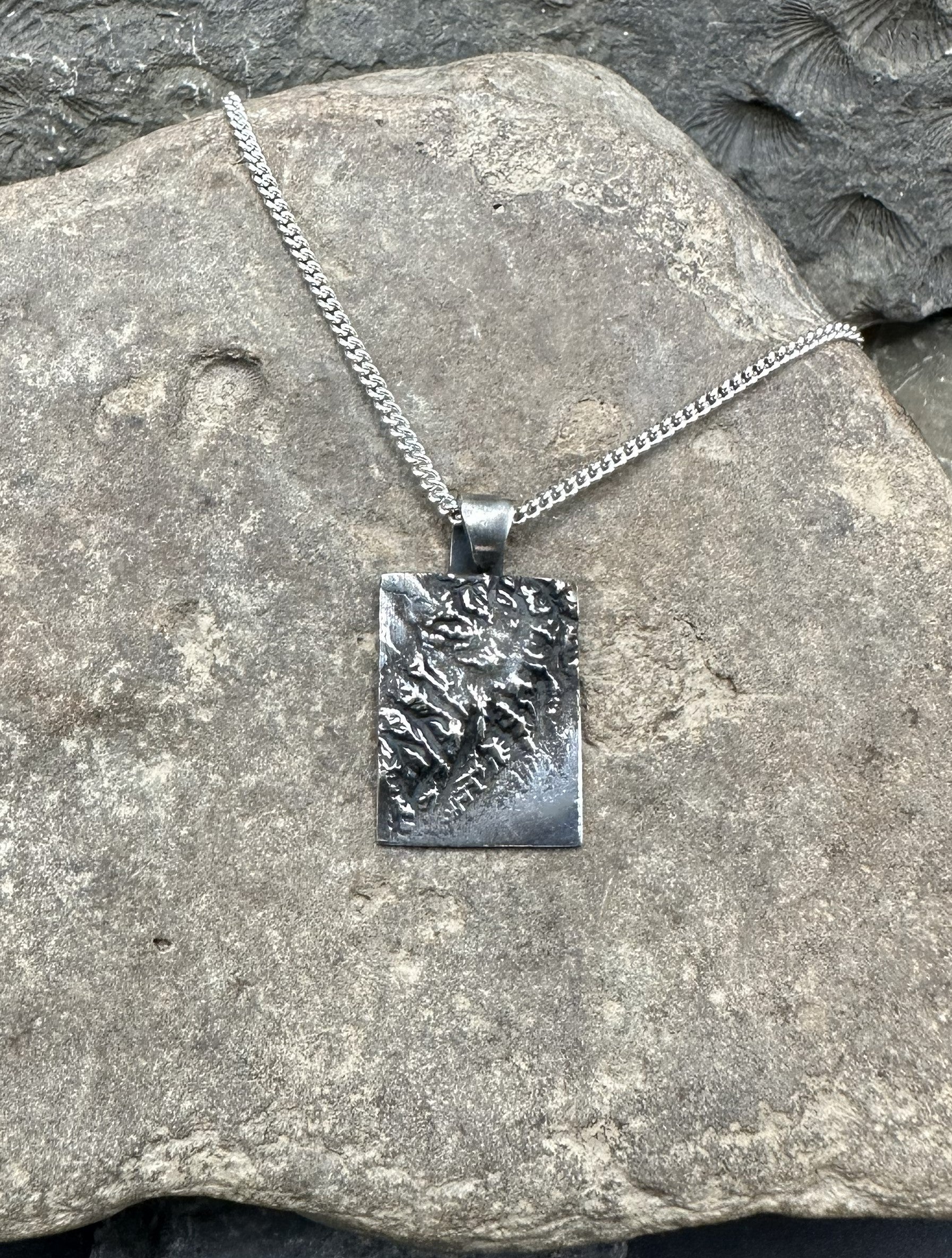 3D fine silver pendant of Kenai Fjords National Park.  Accurately displays the elevations and contours of the park.  