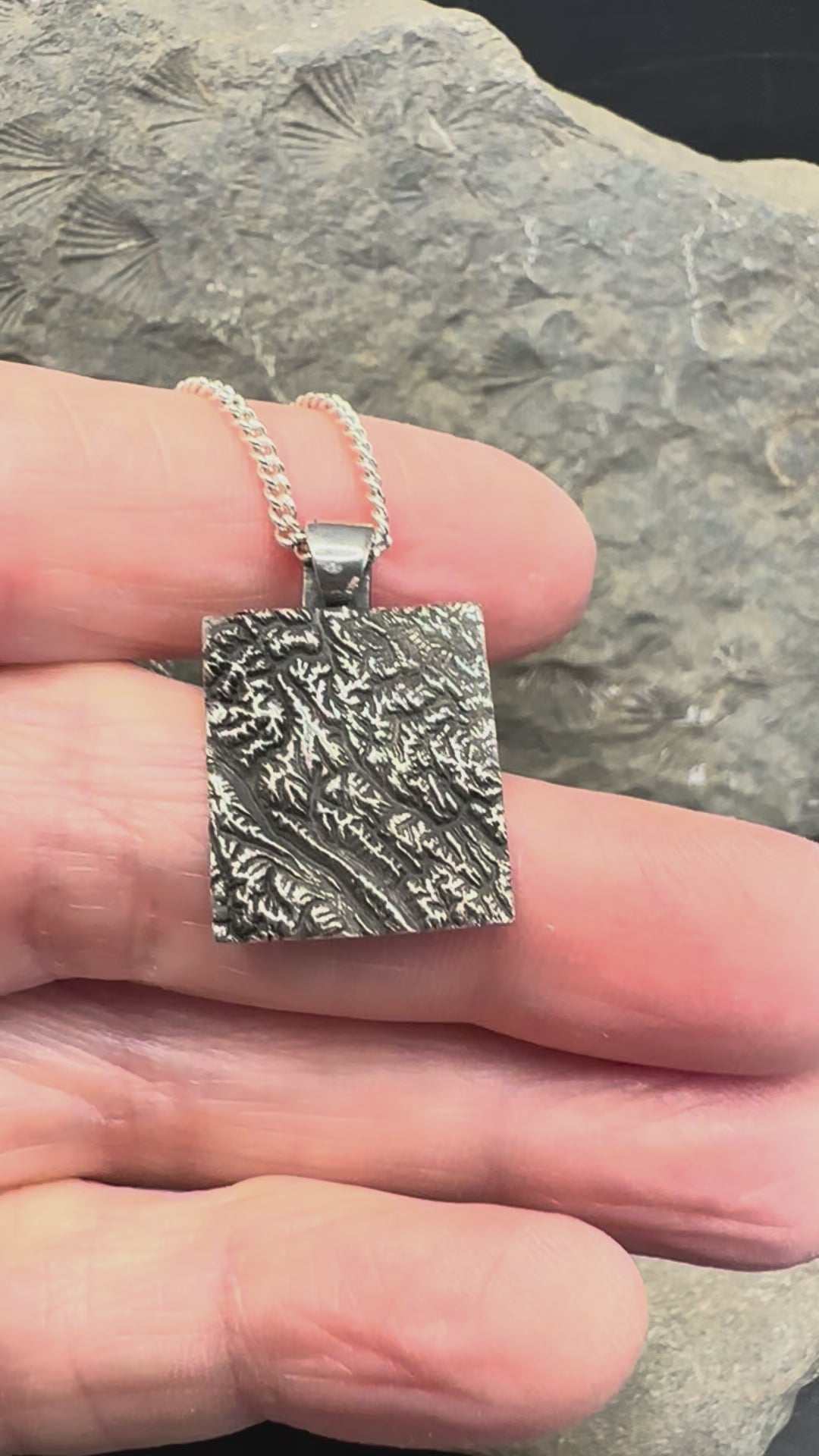 Video of 3D fine silver pendant of Alberta Canada's Banff National Park.  Accurately displays the elevations and contours of the park.  